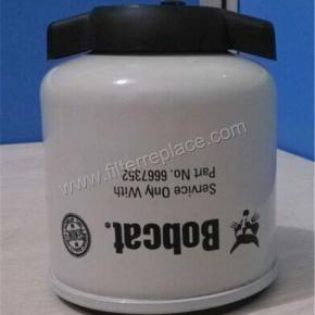 Replace  Bobcat Fuel Filter with water separator 6667352 with a draining valve